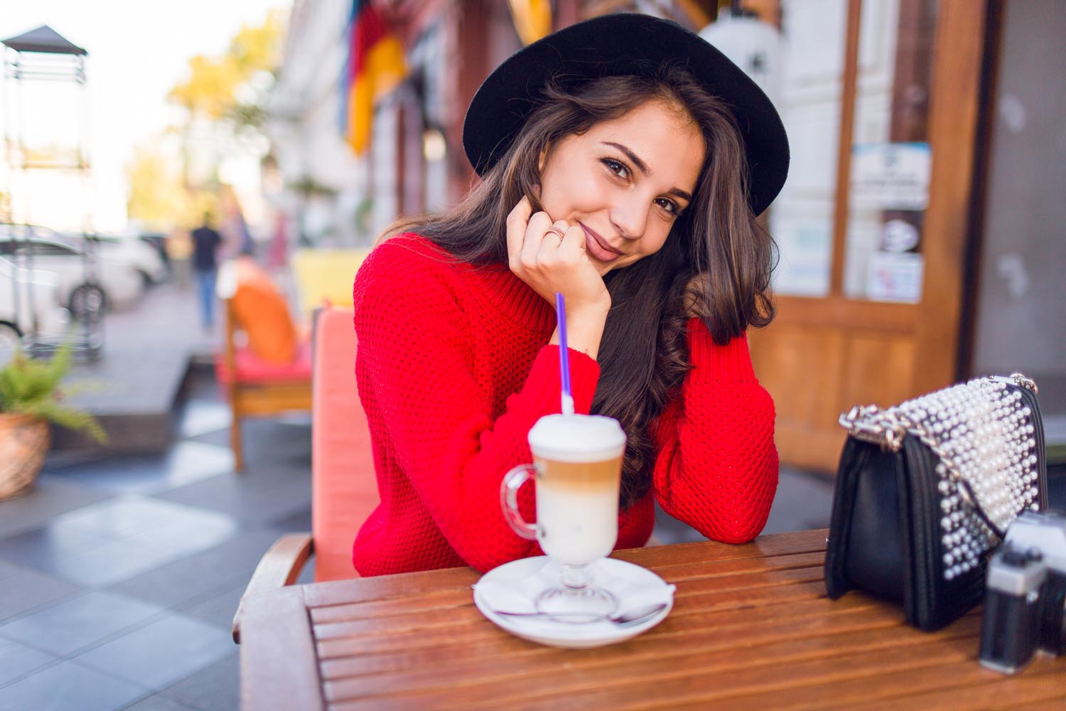 Fashionable Woman In Red Sweater Posing In Cafe 72Dpi